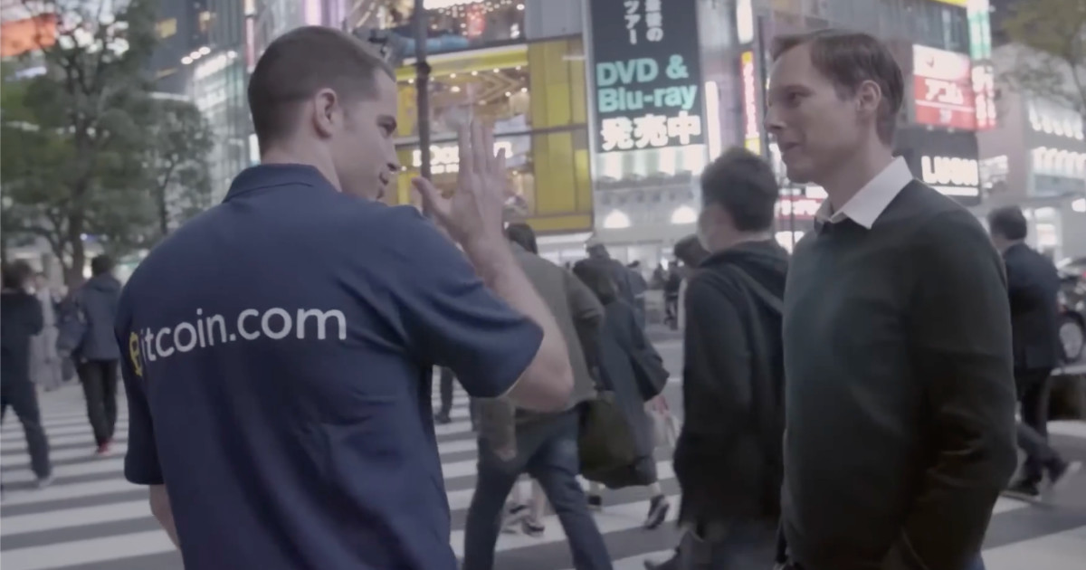 Roger Ver in the Street Wearing a Bitcoin Shirt